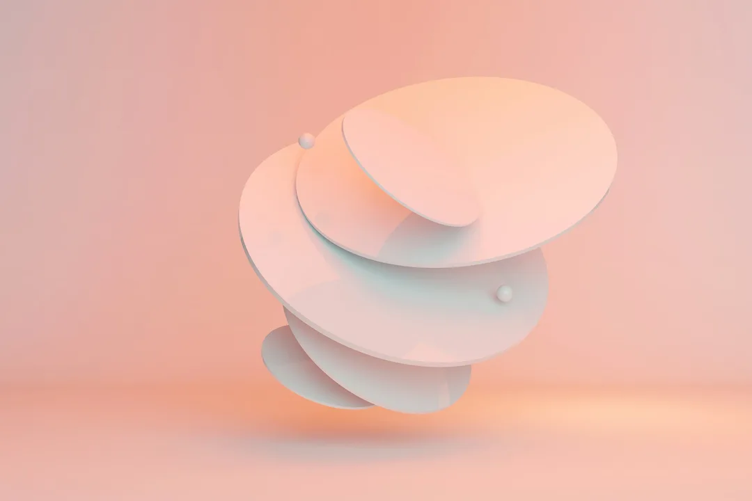 Pale discs floating above one another, a 3D render