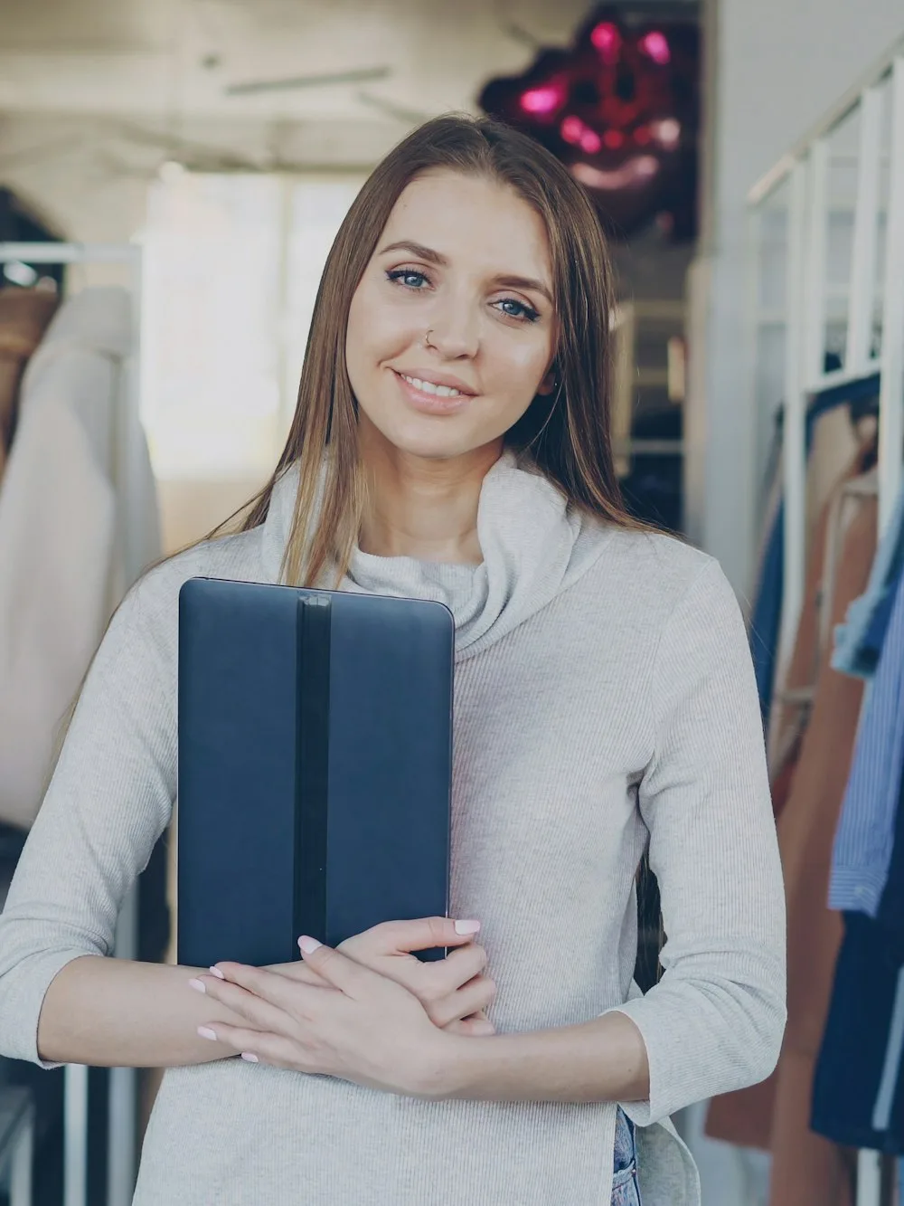 A shop owner standing in her shop